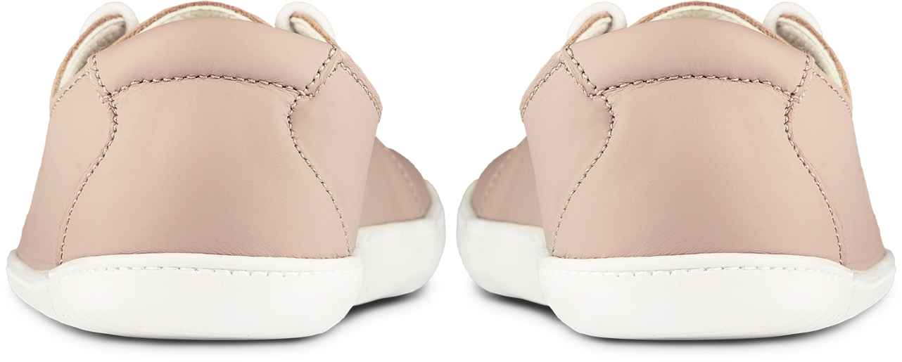 Back of pink low-cut barefoot shoe