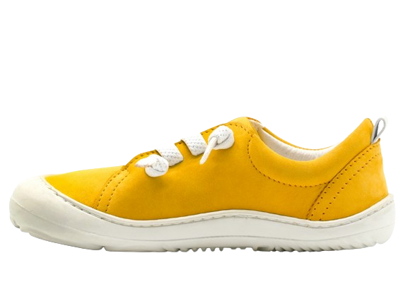 Side of kid's barefoot shoe yellow color.