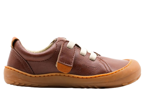 Side of barefoot kid shoe, brown color.