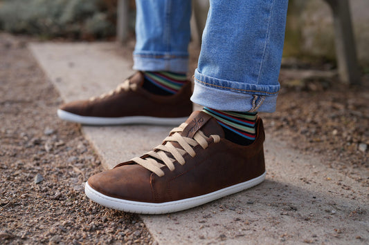 Realistic photo of street barefoot shoes for men. Brown color.