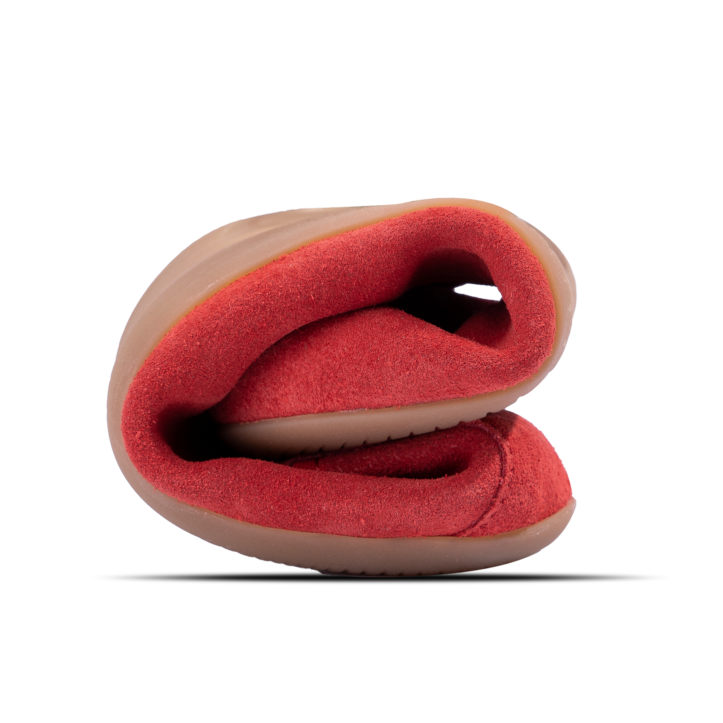 Photo of rolled red barefoot ballerina shoe