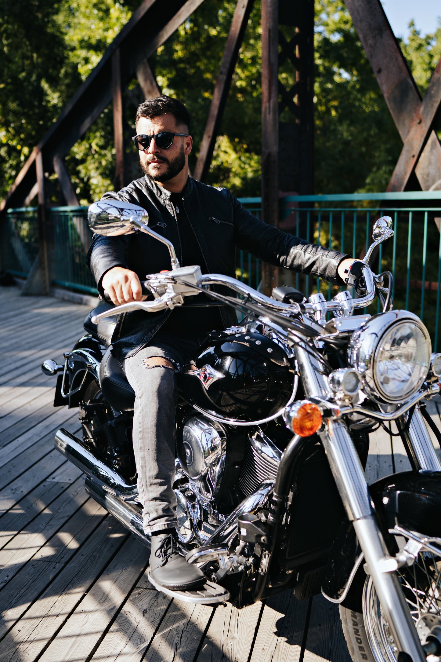 Man on motorbike wearing Black high-cut barefoot shoes