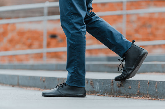 Realistic photo of Black high-cut barefoot shoes