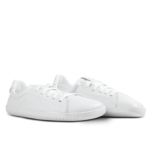 Side of white street barefoot shoes for women.